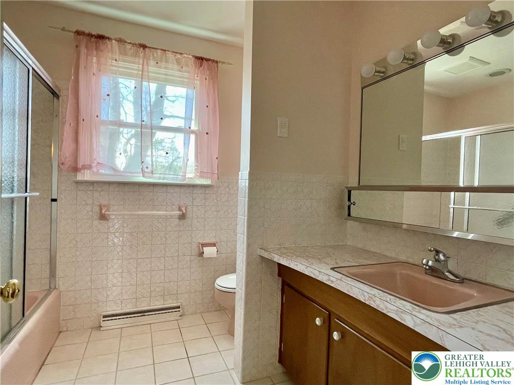 1331 Armstrong Road Bethlehem, PA 18017 - Photo 45 of 47 a bathroom with a sink a toilet and a shower