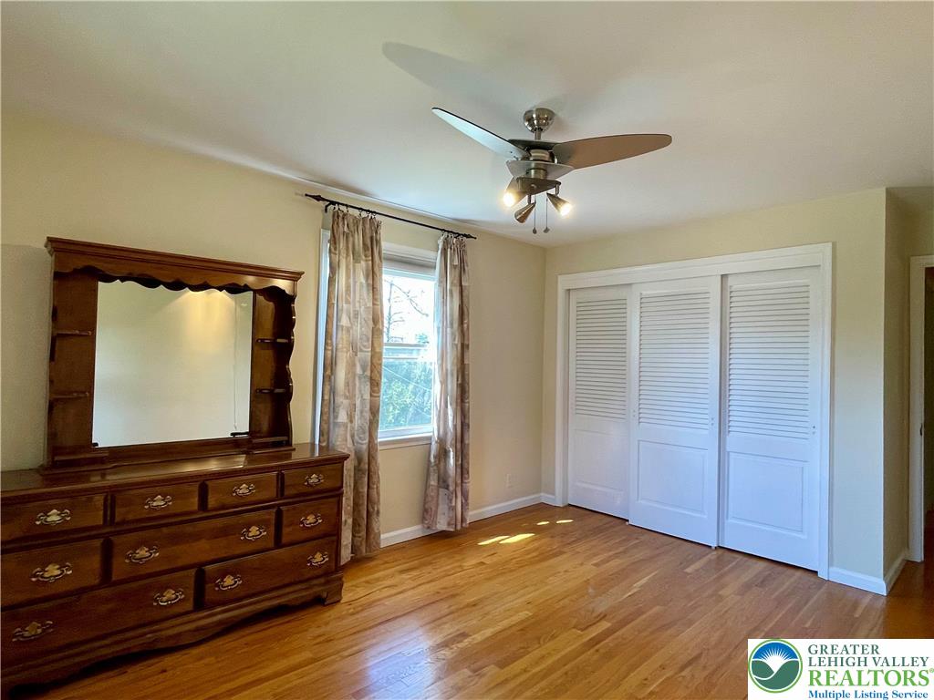 1331 Armstrong Road Bethlehem, PA 18017 - Photo 47 of 47 a view of room with wooden floor and flat screen tv
