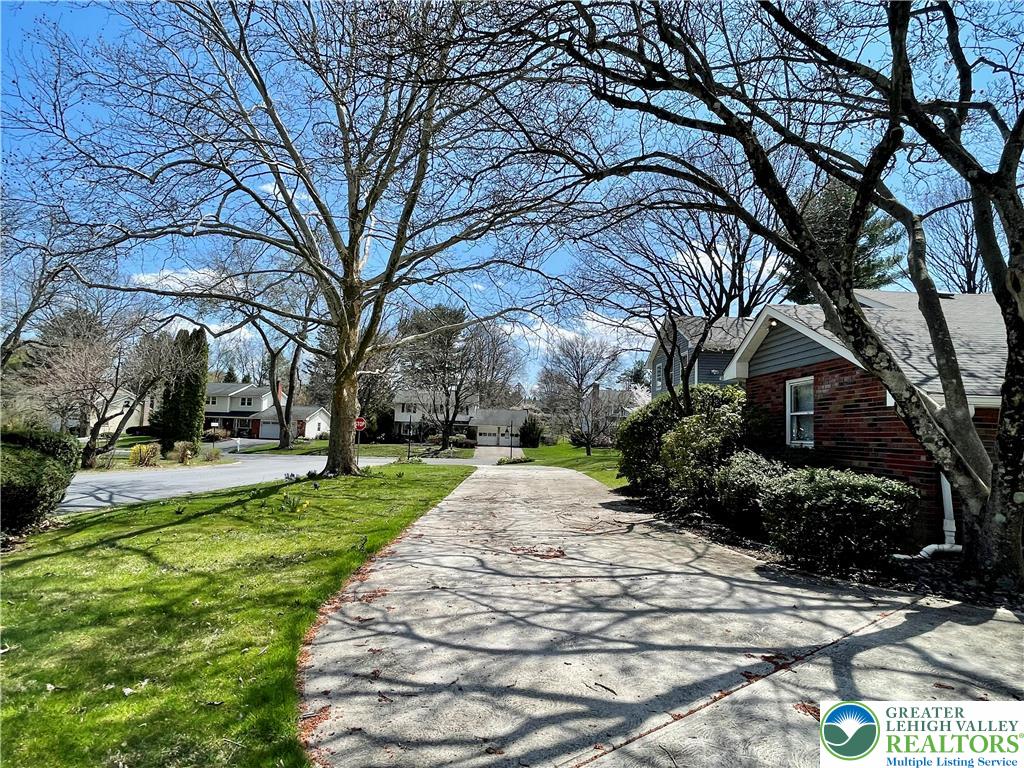 1331 Armstrong Road Bethlehem, PA 18017 - Photo 5 of 47 a view of a yard with plants and trees