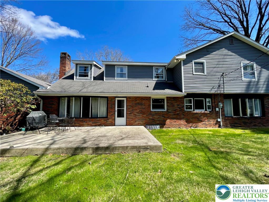 1331 Armstrong Road Bethlehem, PA 18017 - Photo 7 of 47 a view of a house with a yard patio and a yard