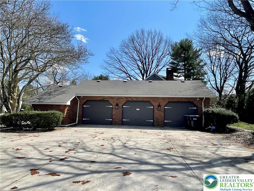 1331 Armstrong Road Bethlehem, PA 18017 - Photo 9 of 47 a front view of a house with a yard