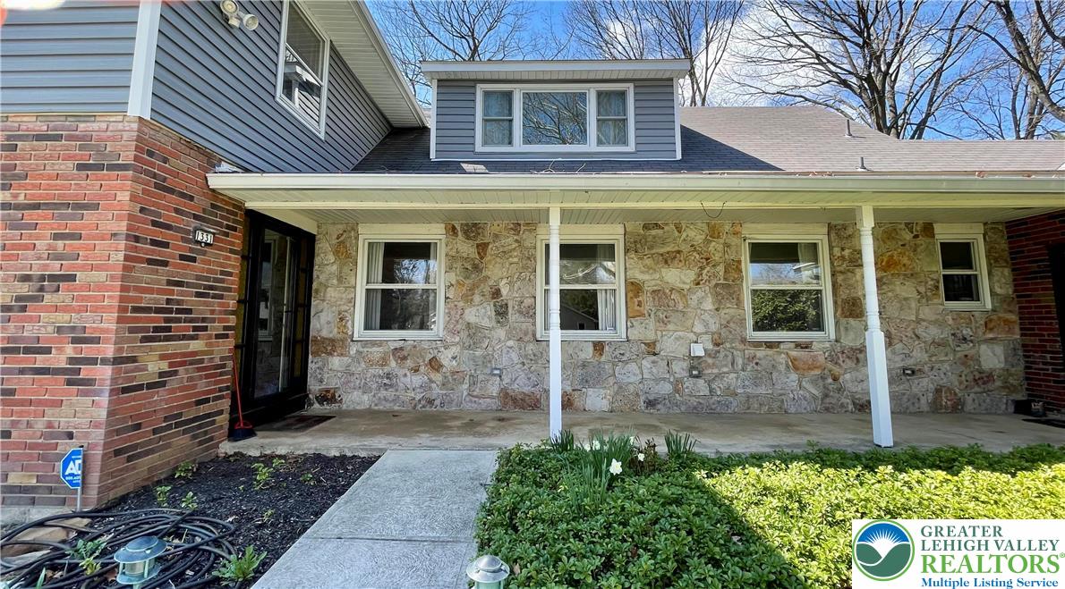 1331 Armstrong Road Bethlehem, PA 18017 - Photo 10 of 47 a view of a brick building with potted plants