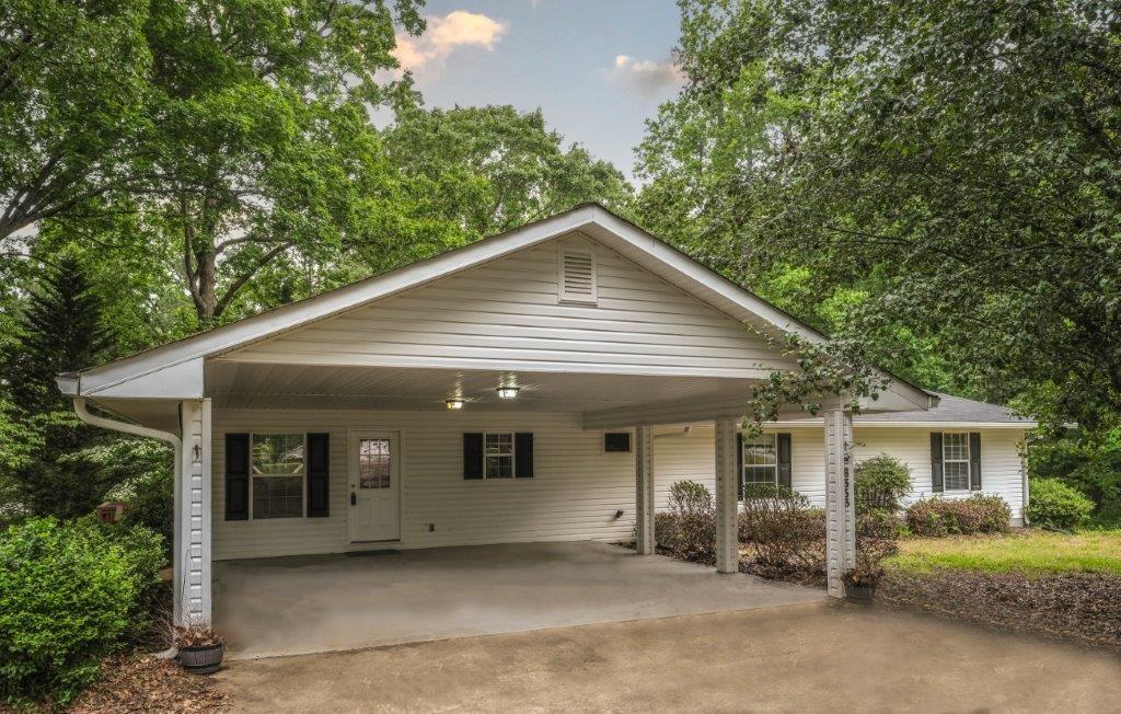 a front view of a house with a garage