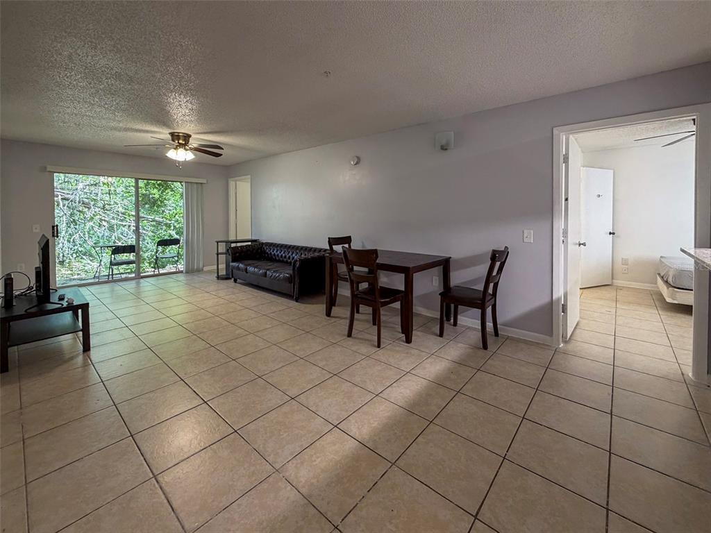 3921 Southwest 34th Street, Unit 301 Gainesville, FL 32608 - Photo 10 of 31 a lobby with furniture and window
