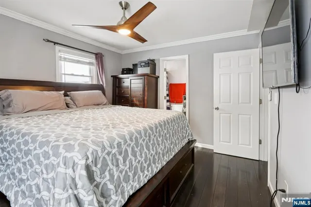 a bed room with a bed and a window