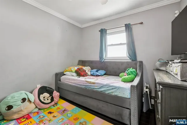 a bedroom with a bed and a table in it