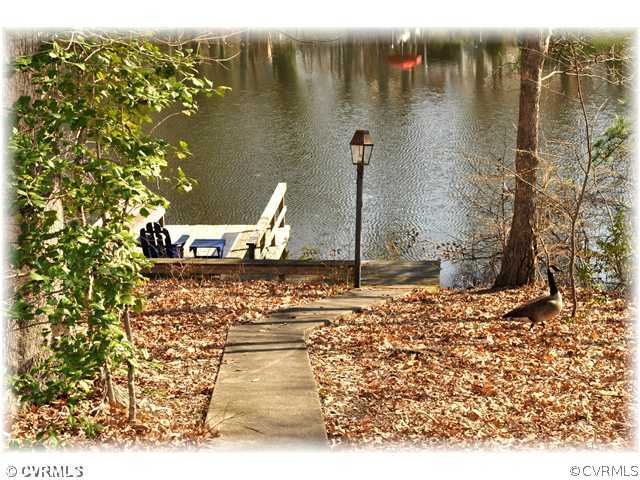 2821 West Brigstock Road Midlothian, VA 23113 - Photo 11 of 12 a view of a lake view