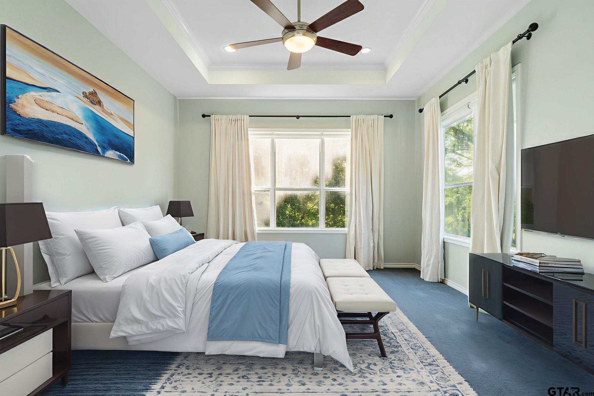 7031 Ridge Pl Circle Tyler, TX 75703 - Photo 15 of 27 a bedroom with a bed and a flat screen tv