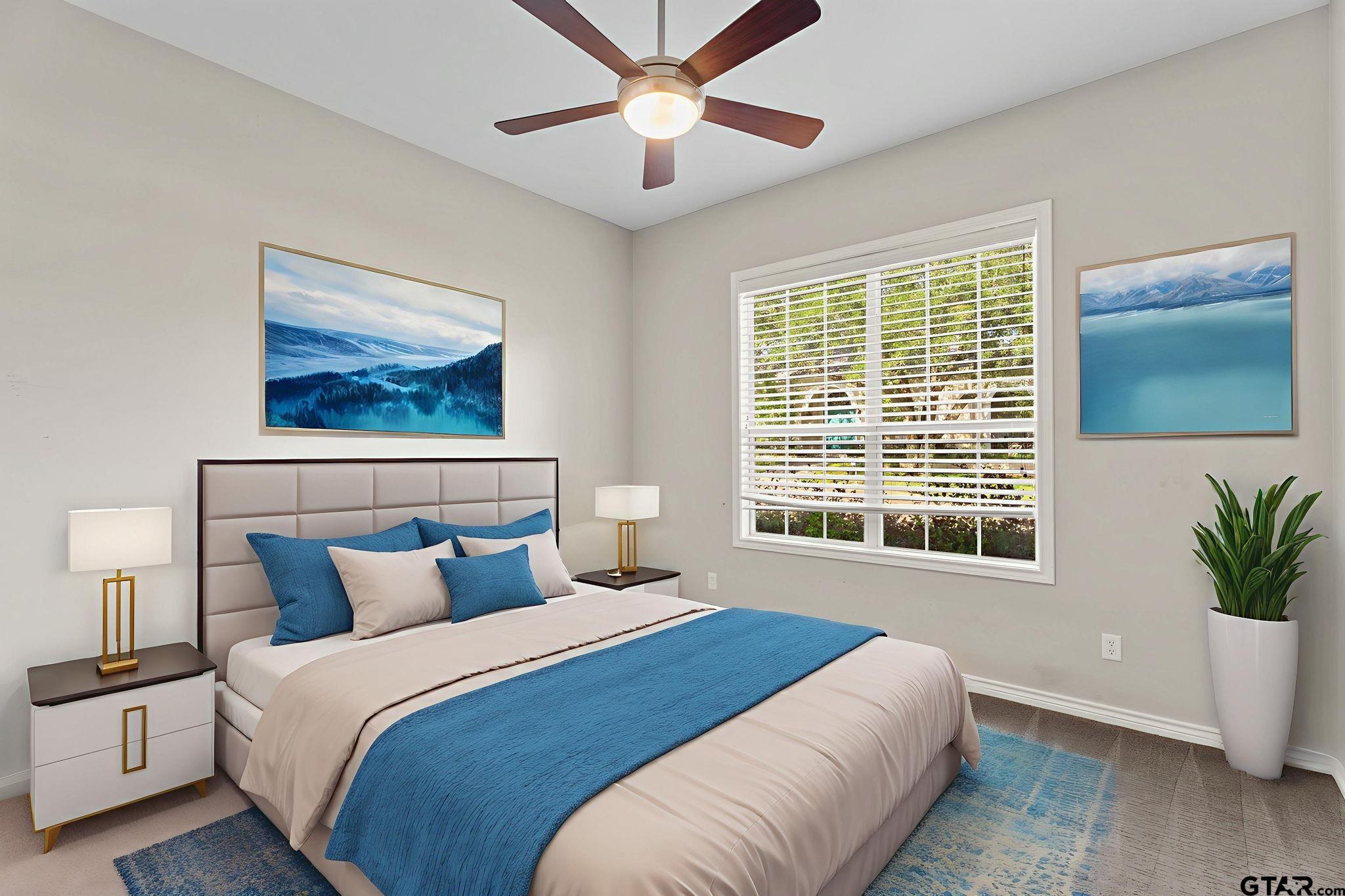 7031 Ridge Pl Circle Tyler, TX 75703 - Photo 17 of 27 a bedroom with a large bed and a potted plant