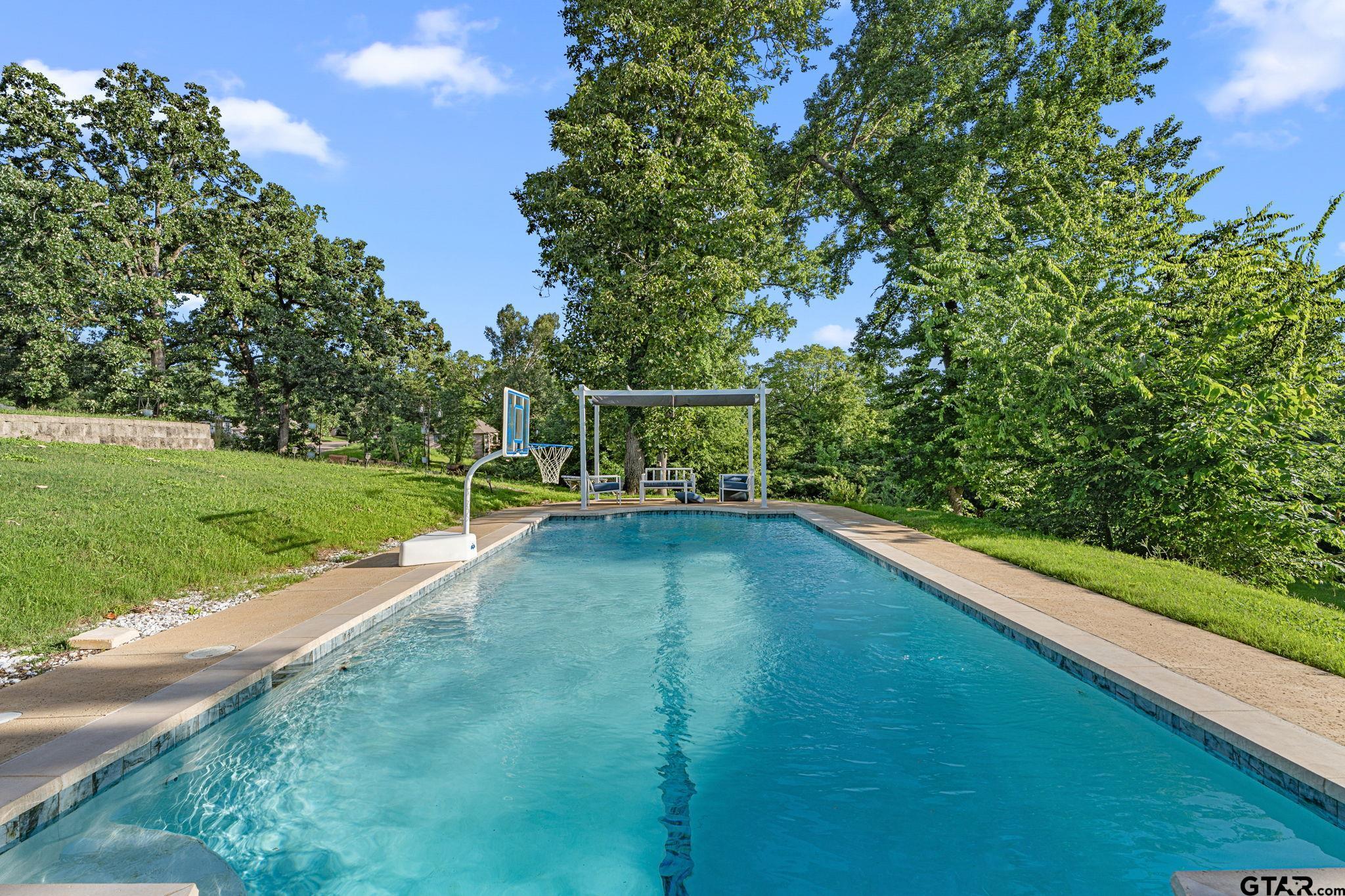 7031 Ridge Pl Circle Tyler, TX 75703 - Photo 22 of 27 a view of a balcony with a yard