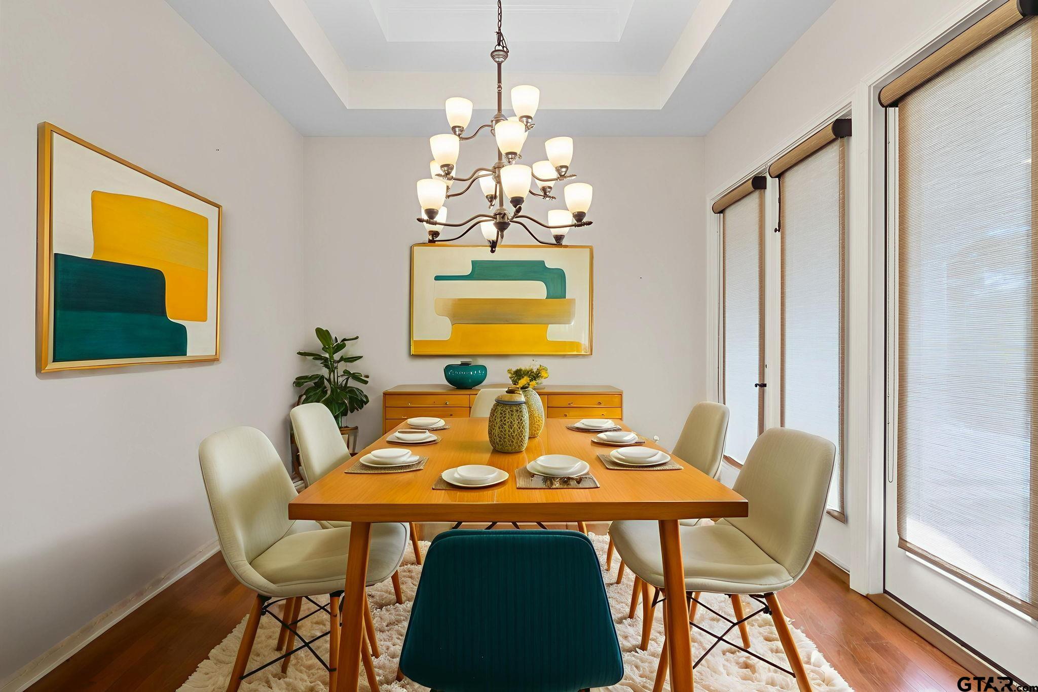 7031 Ridge Pl Circle Tyler, TX 75703 - Photo 8 of 27 a view of a dining room with furniture and chandelier