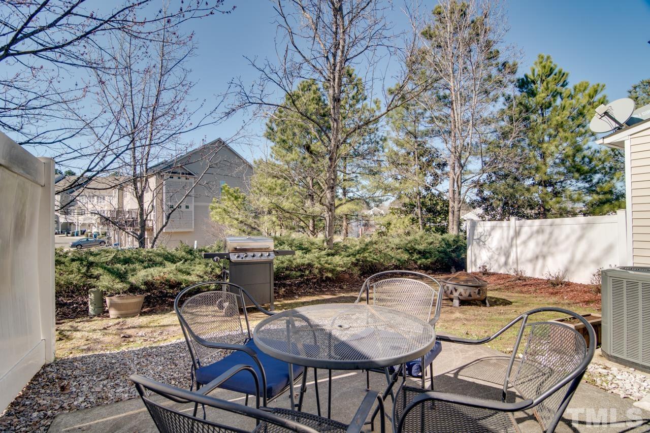 32 Brafferton Court Durham, NC 27713 - Photo 27 of 32 a view of a chairs and table in the patio