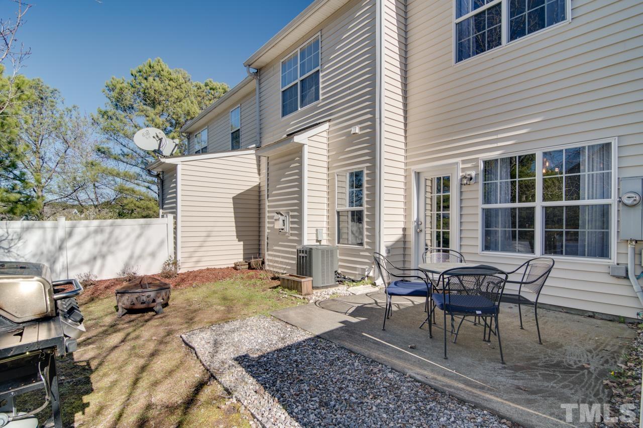 32 Brafferton Court Durham, NC 27713 - Photo 28 of 32 a view of a house with backyard sitting area and sitting area