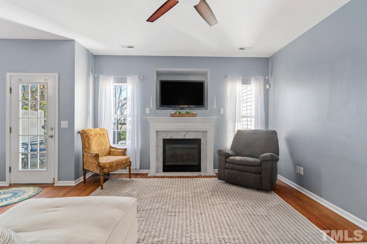 32 Brafferton Court Durham, NC 27713 - Photo 4 of 32 a living room with furniture and a fireplace