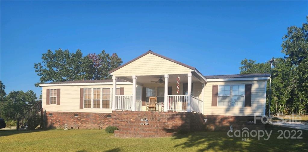 20 Beulah Road Ruby, SC 29741 - Photo 1 of 24 front view of a house with a yard