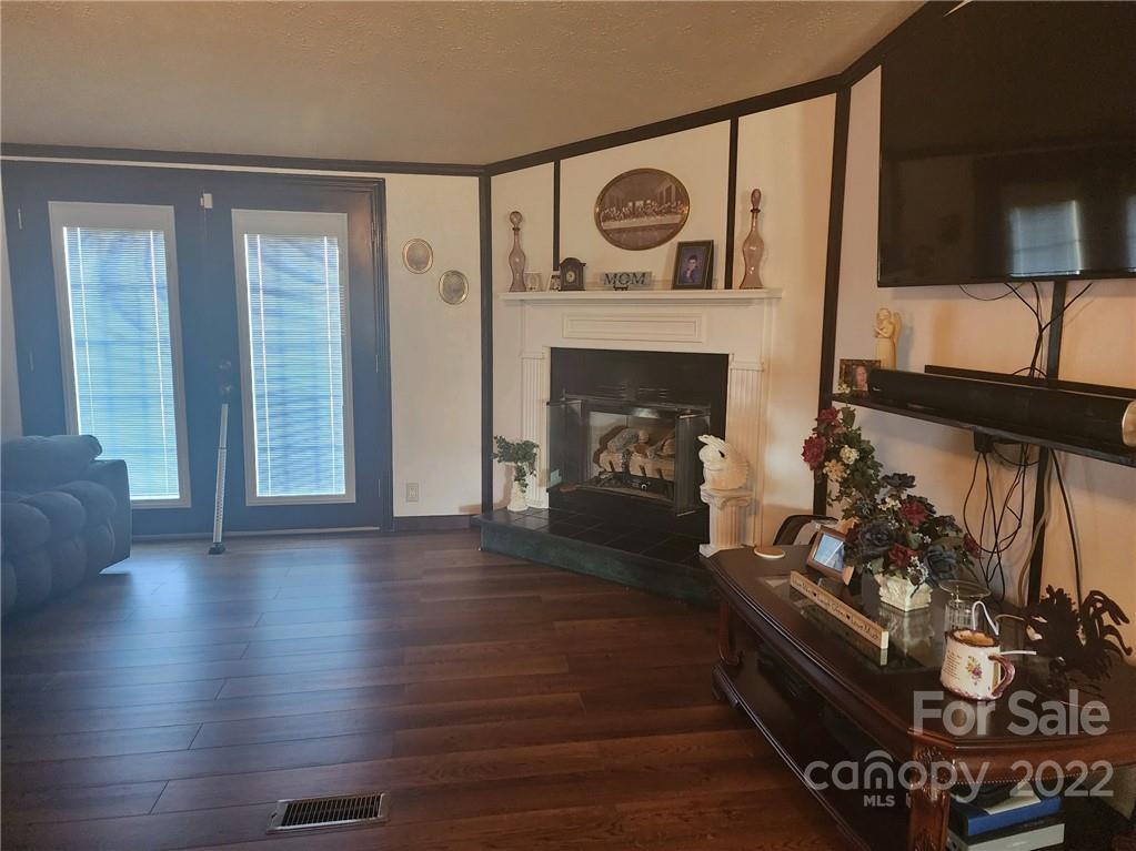 20 Beulah Road Ruby, SC 29741 - Photo 13 of 24 a living room with furniture and a fireplace