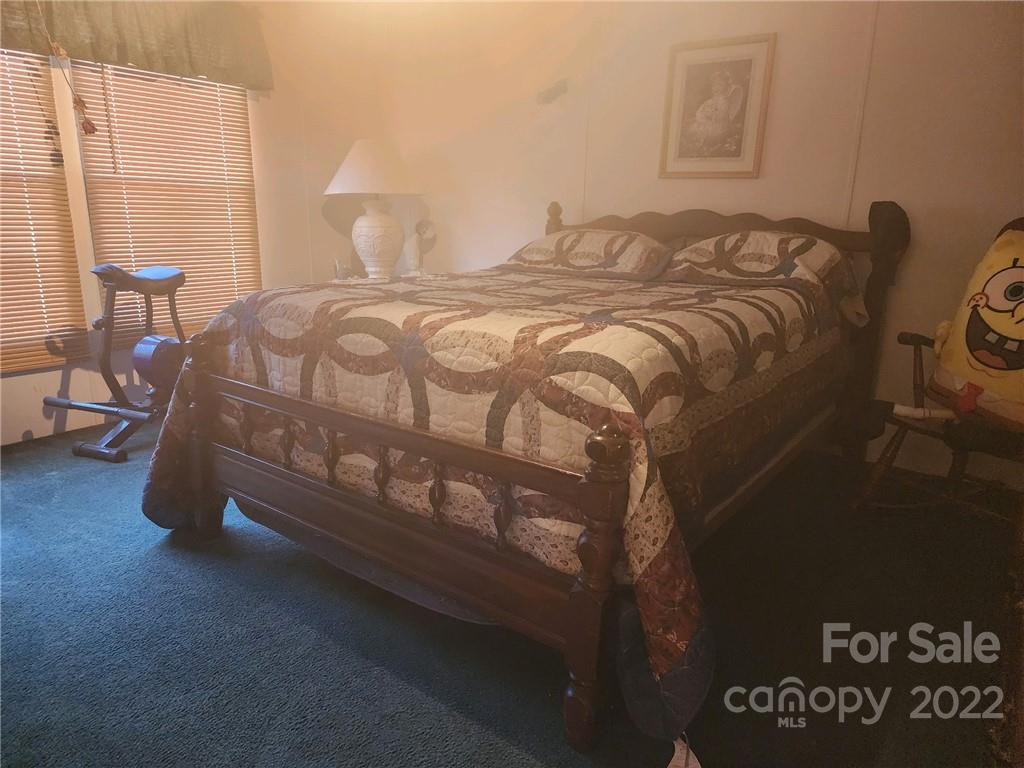 20 Beulah Road Ruby, SC 29741 - Photo 18 of 24 a bedroom with a bed next to a window
