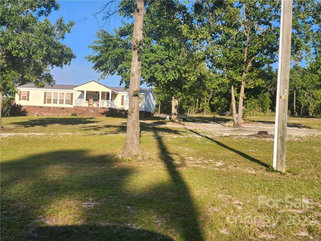 20 Beulah Road Ruby, SC 29741 - Photo 20 of 24 a view of a swimming pool with an outdoor space