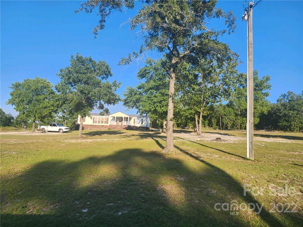 20 Beulah Road Ruby, SC 29741 - Photo 21 of 24 a view of an swimming pool and an outdoor space