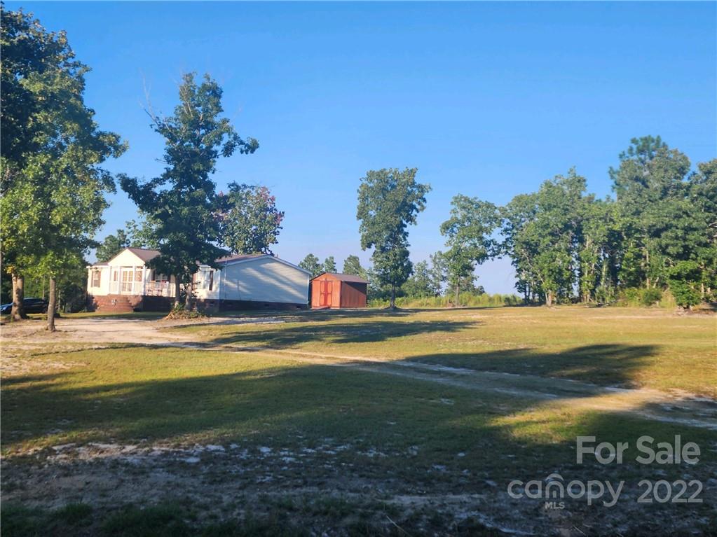 20 Beulah Road Ruby, SC 29741 - Photo 22 of 24 a view of a house with a yard