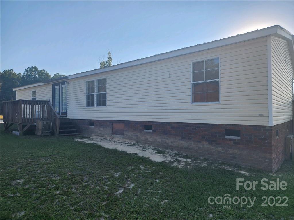 20 Beulah Road Ruby, SC 29741 - Photo 5 of 24 a front view of a house with garden