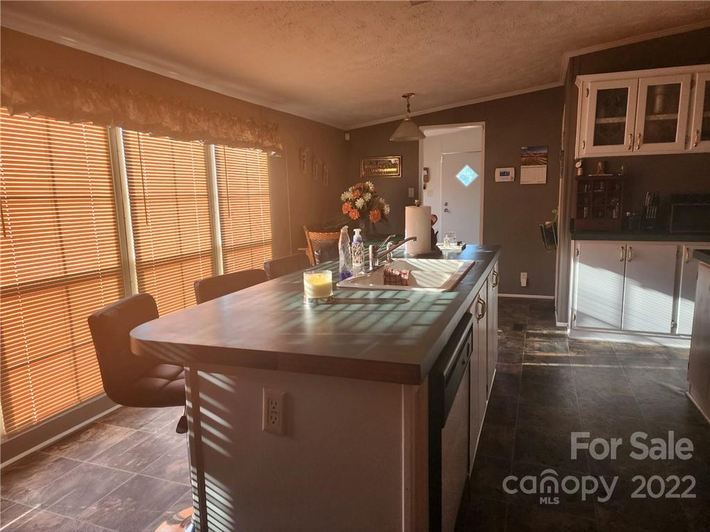 20 Beulah Road Ruby, SC 29741 - Photo 8 of 24 a dining table with a large window