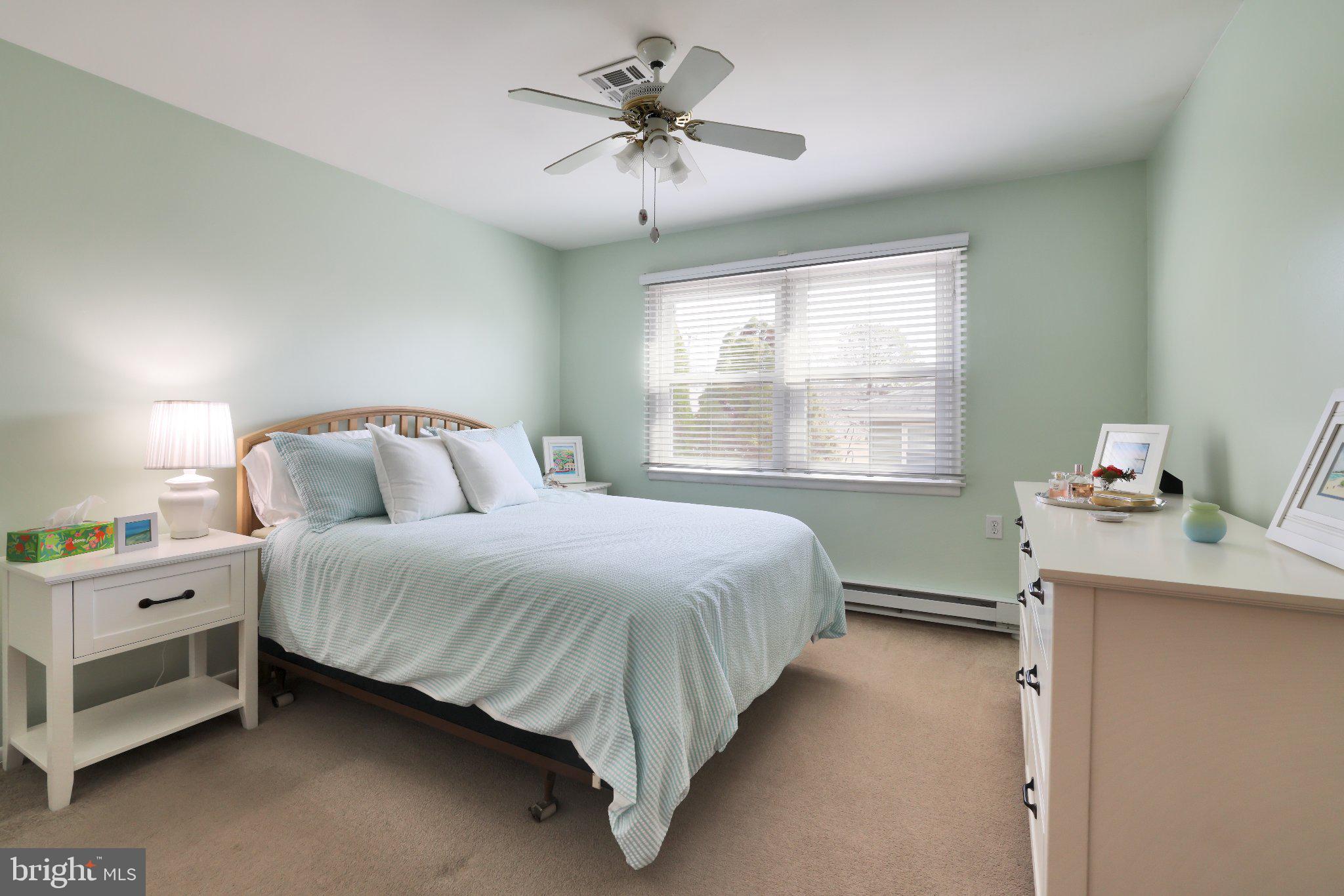 27 Magnolia Road Manahawkin, NJ 08050 - Photo 13 of 26 a bedroom with a bed and window