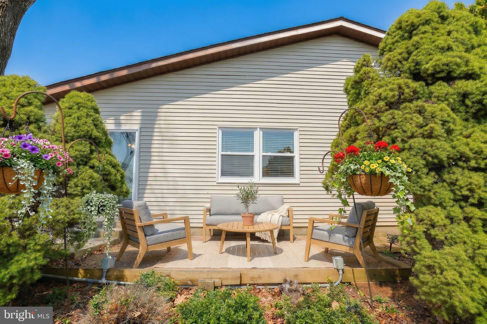 27 Magnolia Road Manahawkin, NJ 08050 - Photo 19 of 26 a view of a house with patio