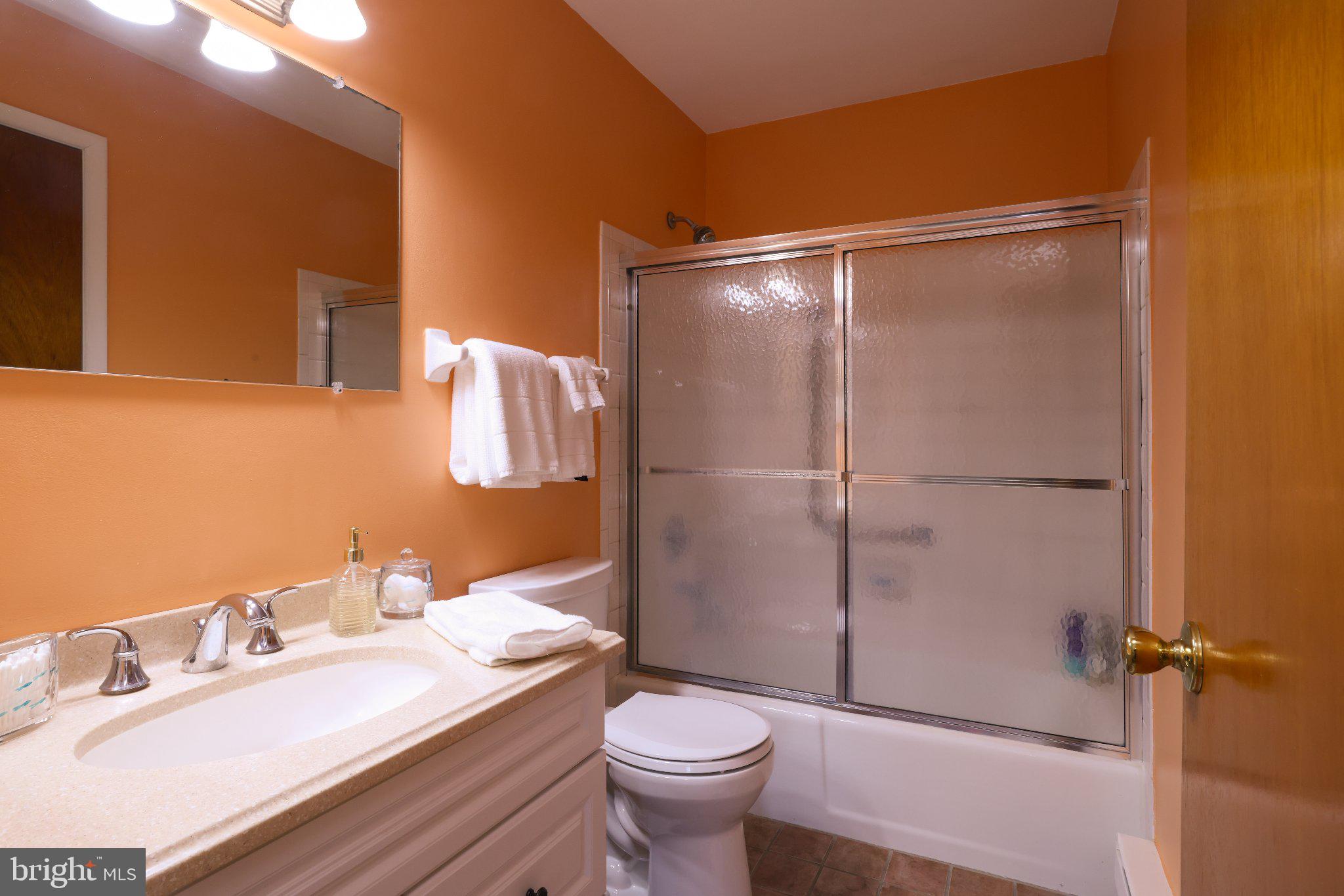 27 Magnolia Road Manahawkin, NJ 08050 - Photo 22 of 26 a bathroom with a sink toilet and shower