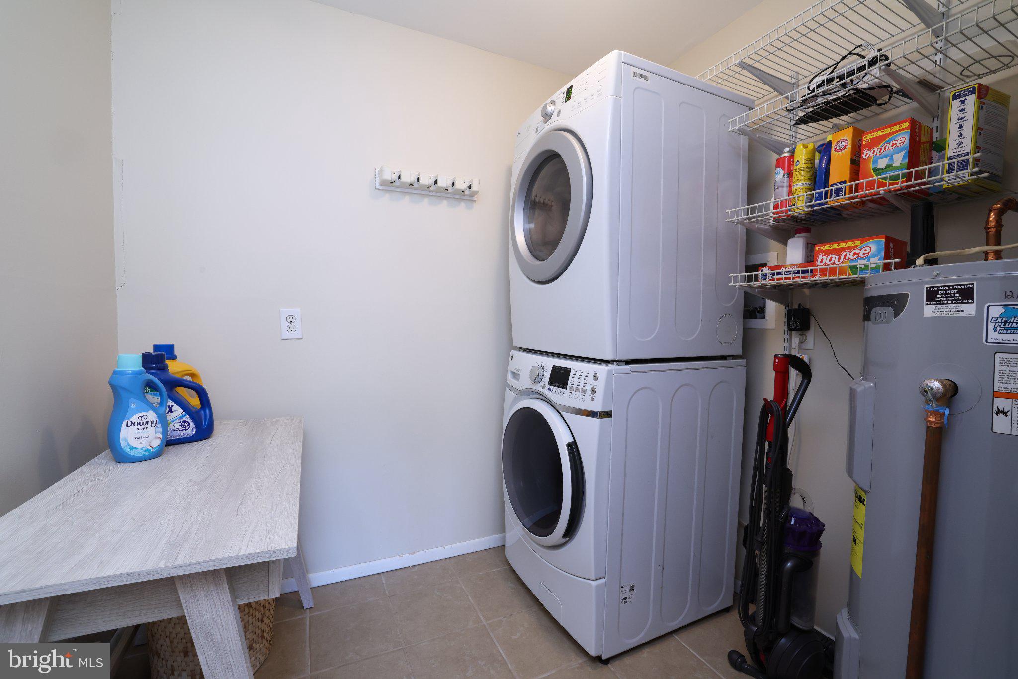 27 Magnolia Road Manahawkin, NJ 08050 - Photo 23 of 26 a utility room with dryer and washer