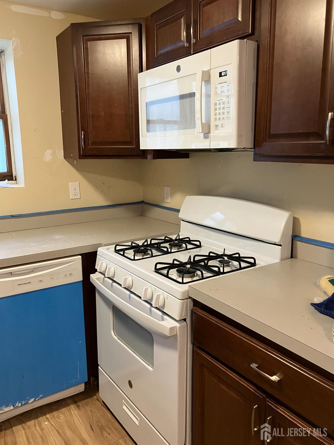 49 B Middlesex Road Old Bridge, NJ 07747 - Photo 3 of 14 a white stove top oven sitting inside of a kitchen
