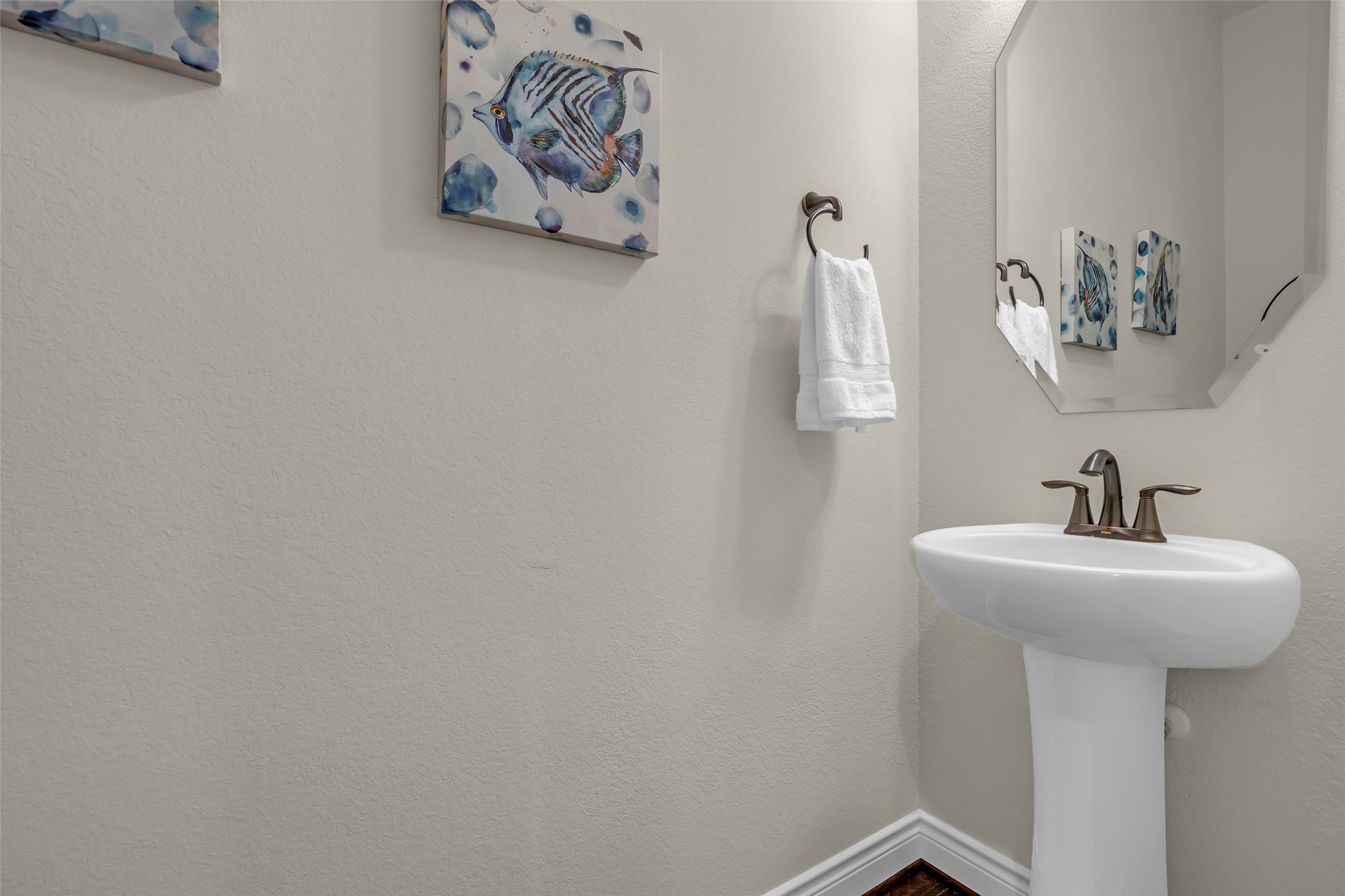 14003 South Evergreen Ridge Court Conroe, TX 77384 - Photo 30 of 43 Conveniently located just off the foyer, the powder bath is easily accessible for guests.