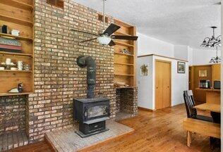 4607 Reforestation Road Suamico, WI 54313 - Photo 24 of 37 Living Room & Wood Stove