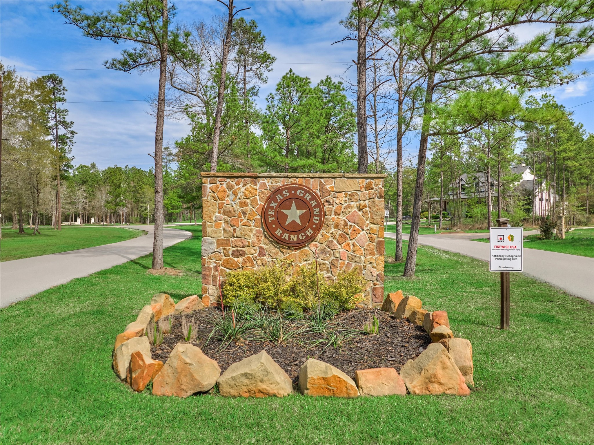 498 Lonestar Road Huntsville, TX 77340 - Photo 4 of 20 a view of a garden with a bench