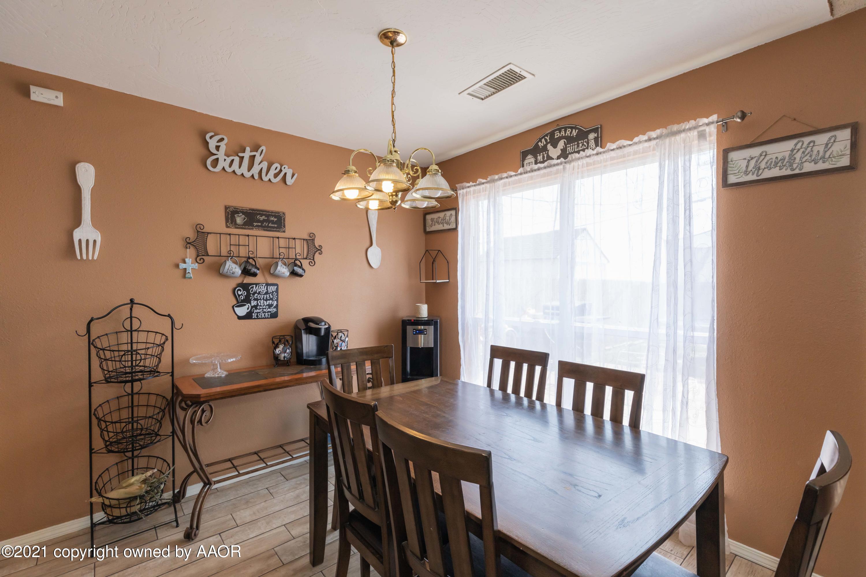 1025 Ketler Street Amarillo, TX 79104 - Photo 6 of 31 a view of a dining room with furniture and window