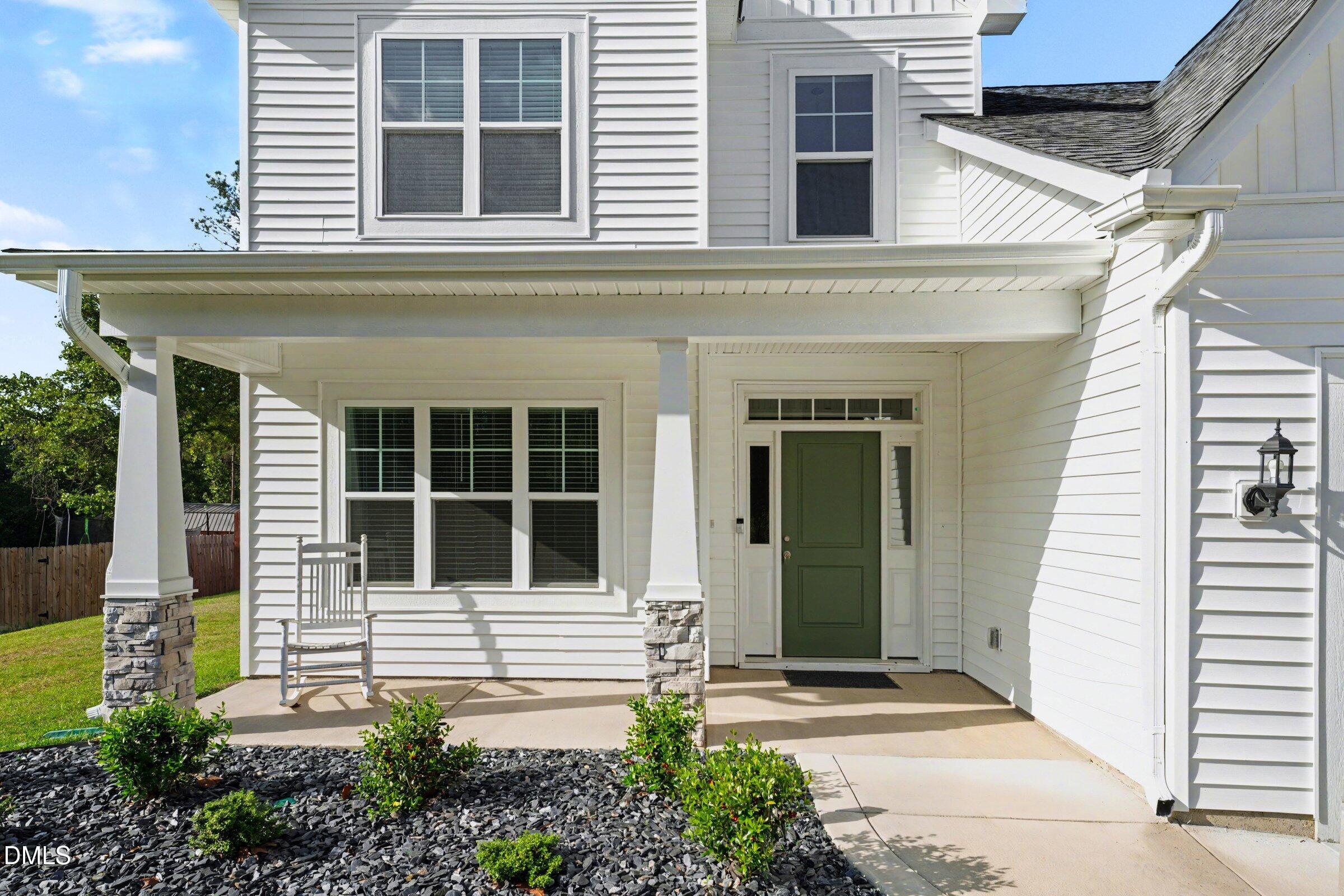 2815 Lemuel Black Road Spring Lake, NC 28390 - Photo 20 of 37 a front view of a house with a yard