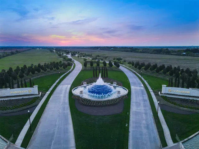 an aerial view of a house with outdoor space