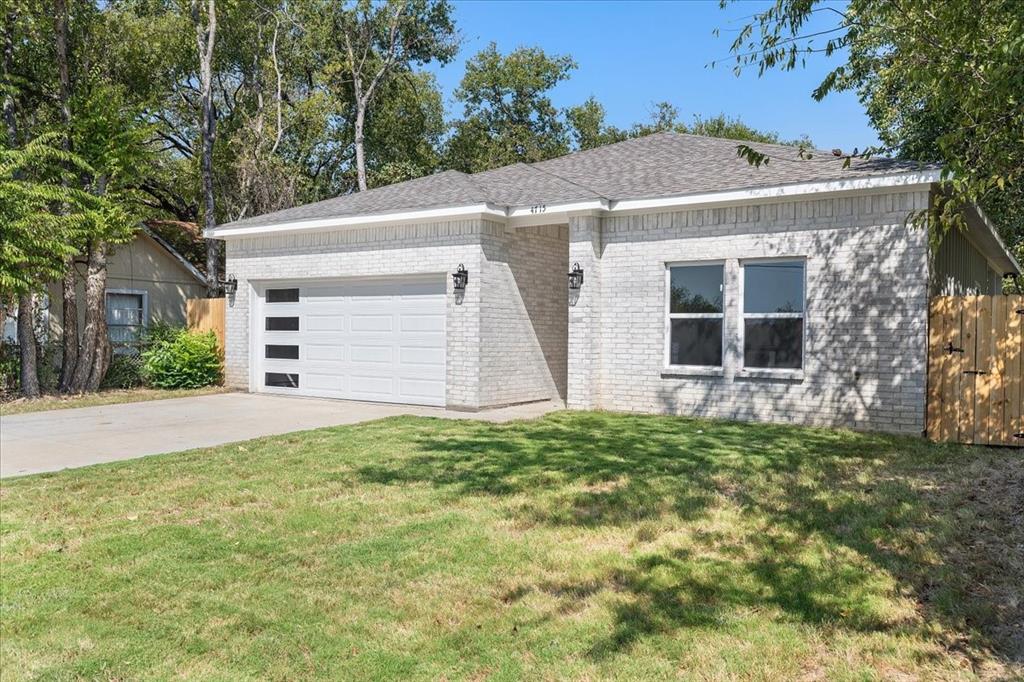 4715 Ramey Avenue Fort Worth, TX 76105 - Photo 5 of 32 front view of a house with a yard