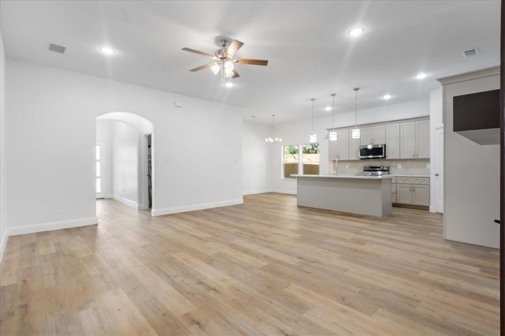 4715 Ramey Avenue Fort Worth, TX 76105 - Photo 6 of 32 a view of kitchen with sink and refrigerator