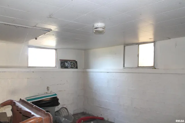 a view of storage and utility room with washer and dryer