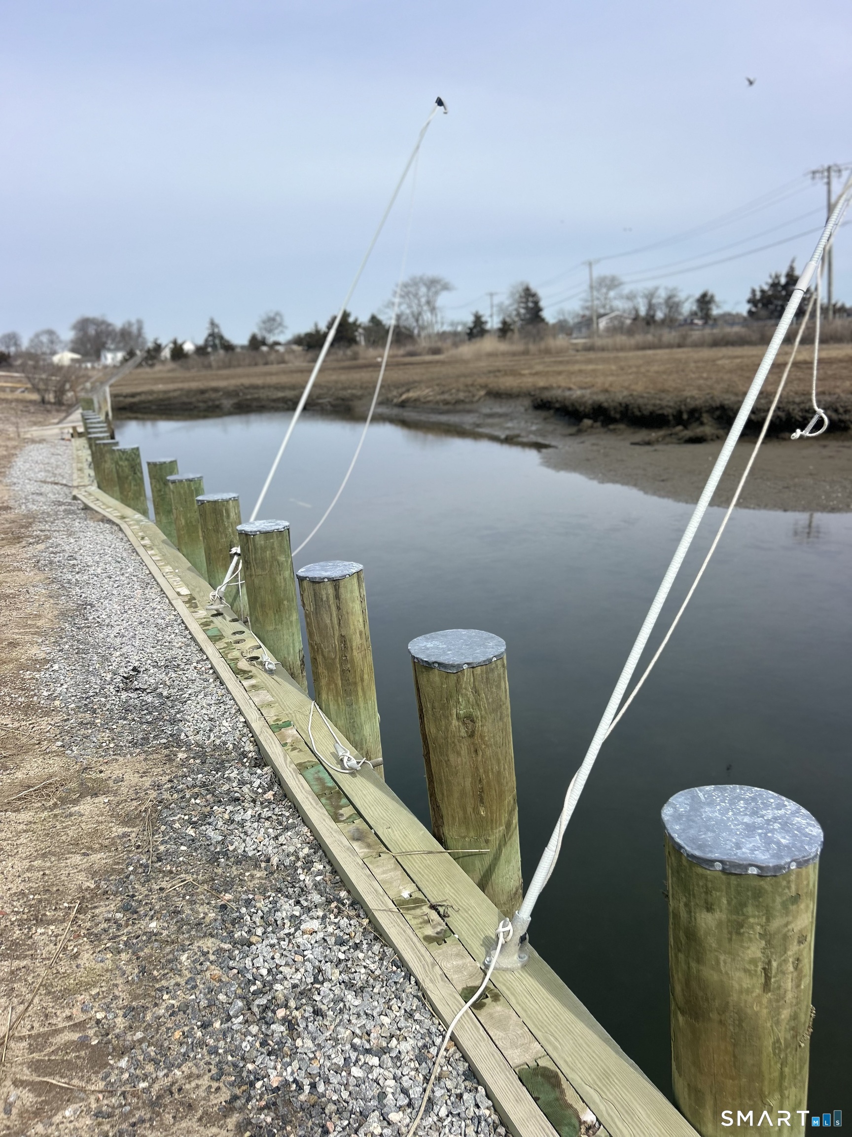 12 Toms Road Old Saybrook, CT 06475 - Photo 3 of 3 a view of a balcony with chairs