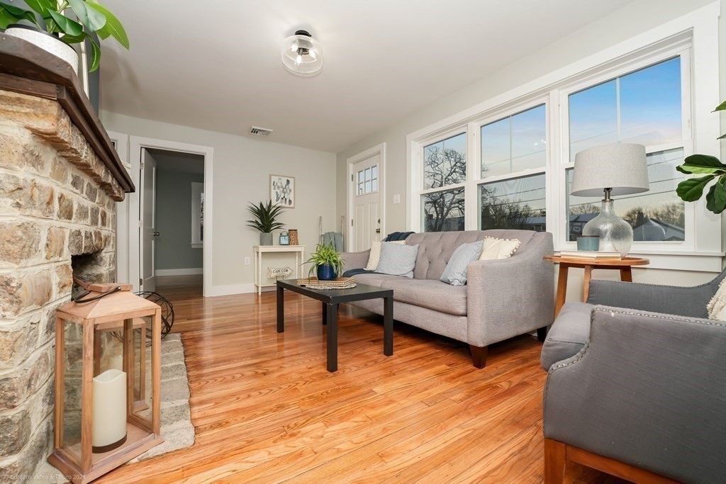 5 Harvard Street Fairhaven, MA 02719 - Photo 11 of 29 a living room with furniture and a wooden floor