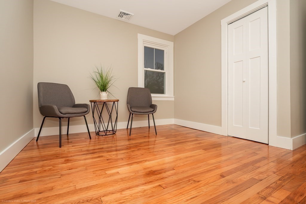 5 Harvard Street Fairhaven, MA 02719 - Photo 20 of 29 a view of a livingroom with furniture and wooden floor