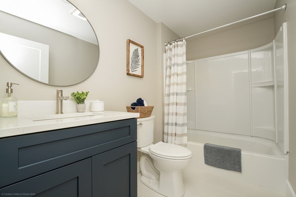 5 Harvard Street Fairhaven, MA 02719 - Photo 21 of 29 a bathroom with a sink a toilet and shower