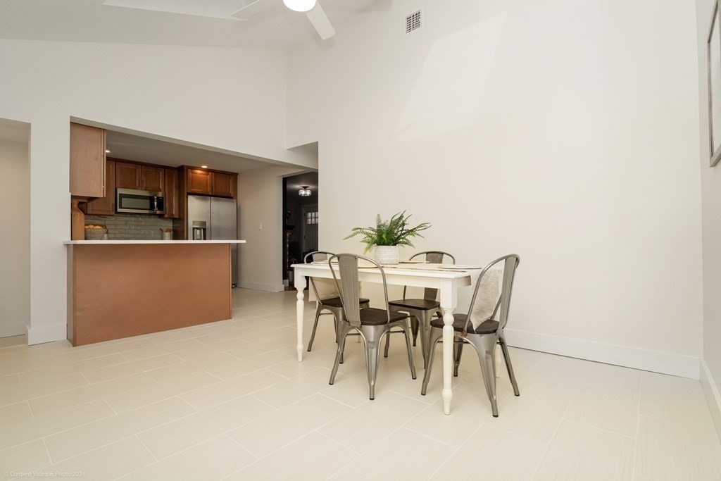 5 Harvard Street Fairhaven, MA 02719 - Photo 8 of 29 a dining room with furniture and window