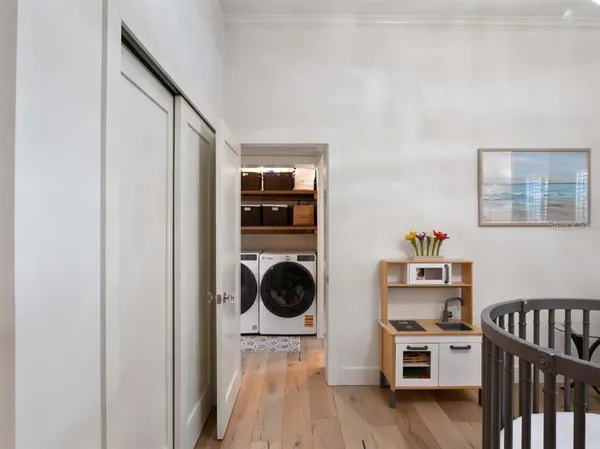 a view of kitchen and utility room