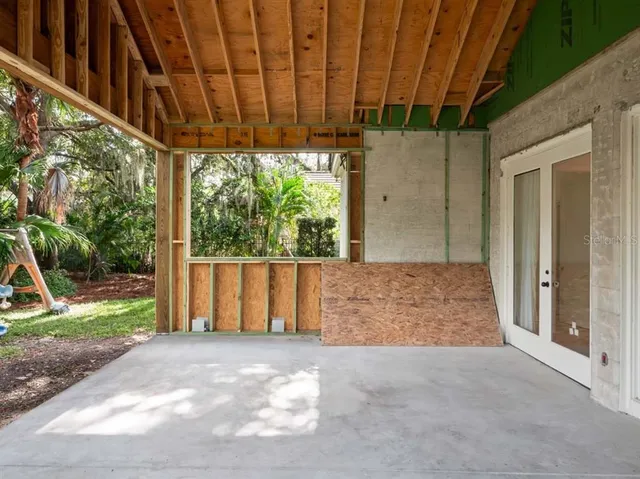 a view of backyard with tub