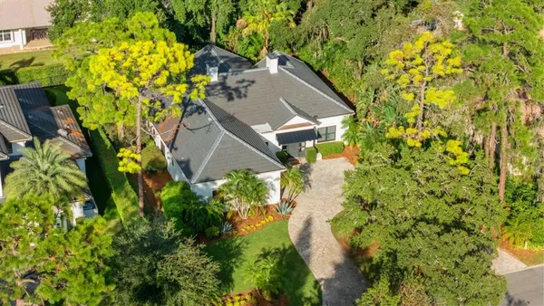 view of a house with a yard