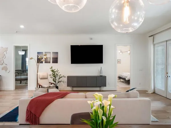 a living room with a couch and a flat screen tv
