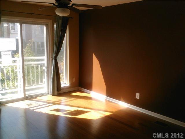 631 Raphael Place Charlotte, NC 28205 - Photo 3 of 5 a view of empty room with floor to ceiling window